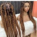 YVA- HAND BRAIDED KNOTLESSJUMBO BRAIDED OMBRE WIG